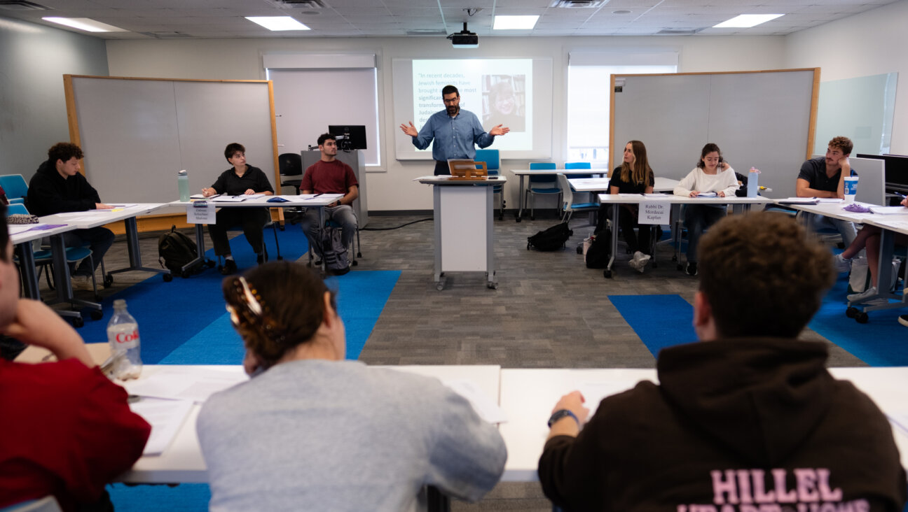 Geoffrey Claussen, a Jewish ethics scholar and chair of the religious studies department, teaches a class on Sept. 30.