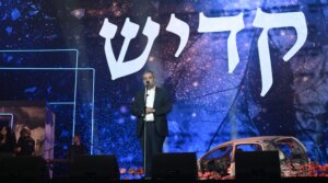 Elchanan Danino, whose son was murdered in captivity in Gaza, leads the Mourner’s Kaddish at the civilian Oct. 7 memorial ceremony at Hayarkon Park in Tel Aviv, Oct. 7, 2025. 