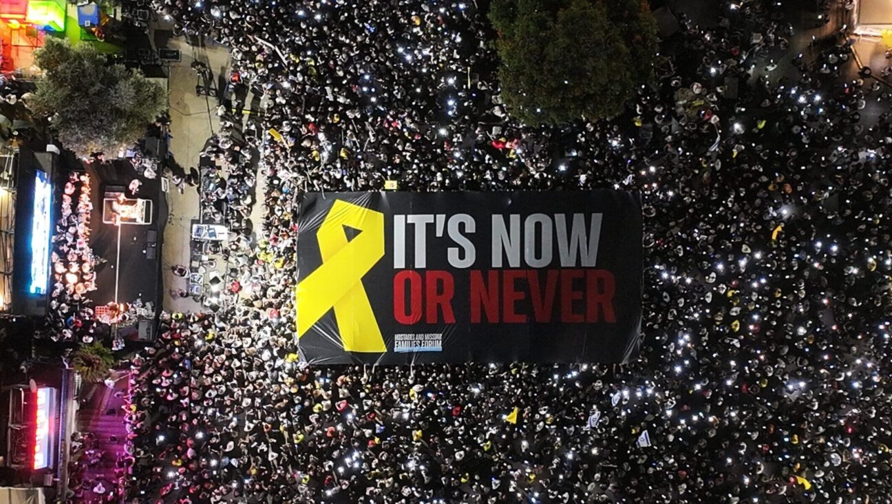 People gather to stage a protest demanding an end to the war in Gaza and the return of the hostages, at Hostages Square in Tel Aviv, Israel on Oct. 04, 2025.