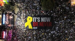 People gather to stage a protest demanding an end to the war in Gaza and the return of the hostages, at Hostages Square in Tel Aviv, Israel on Oct. 04, 2025.