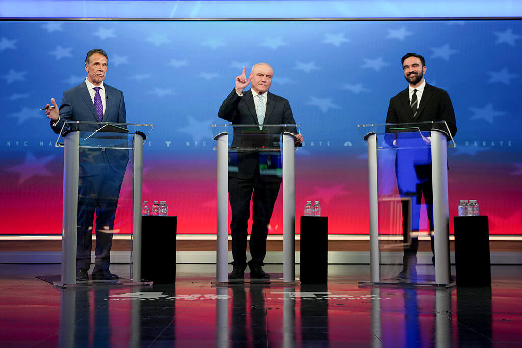 Mayoral candidates, Independent nominee former New York Gov. Andrew Cuomo, Republican nominee Curtis Sliwa and Democratic nominee Zohran Mamdani participate in a mayoral debate on October 16, 2025.