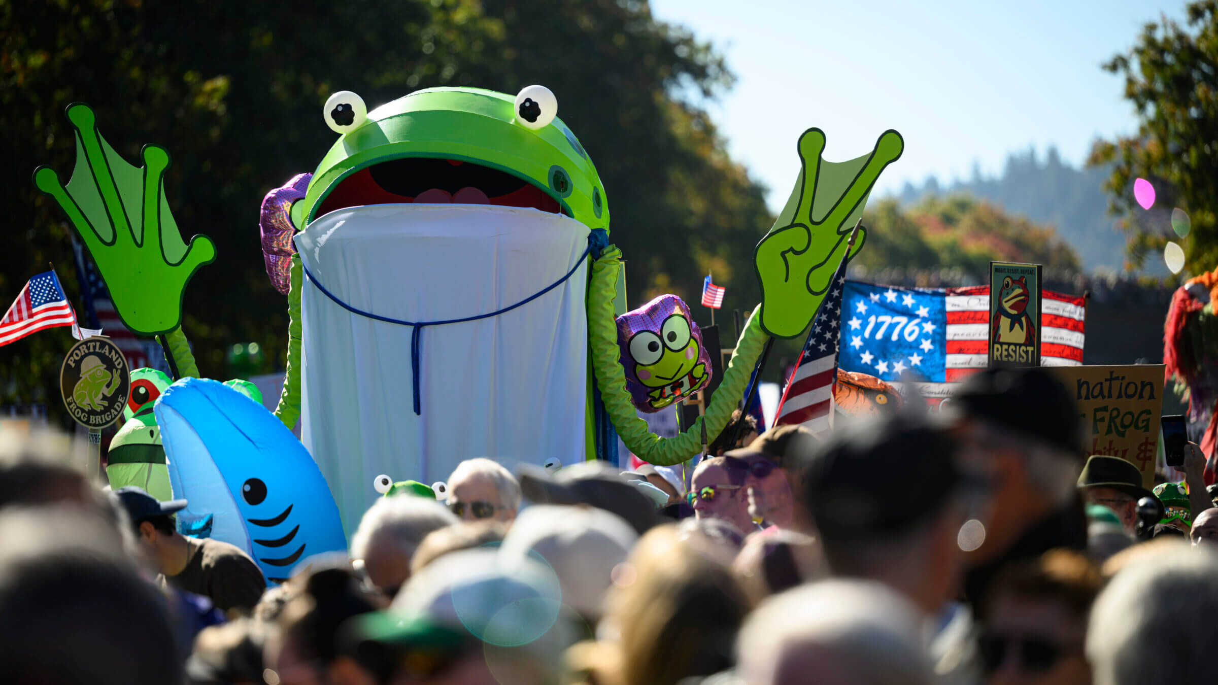 A demonstrators in a frog costume attends a 'No Kings' march in Portland, Oregon.