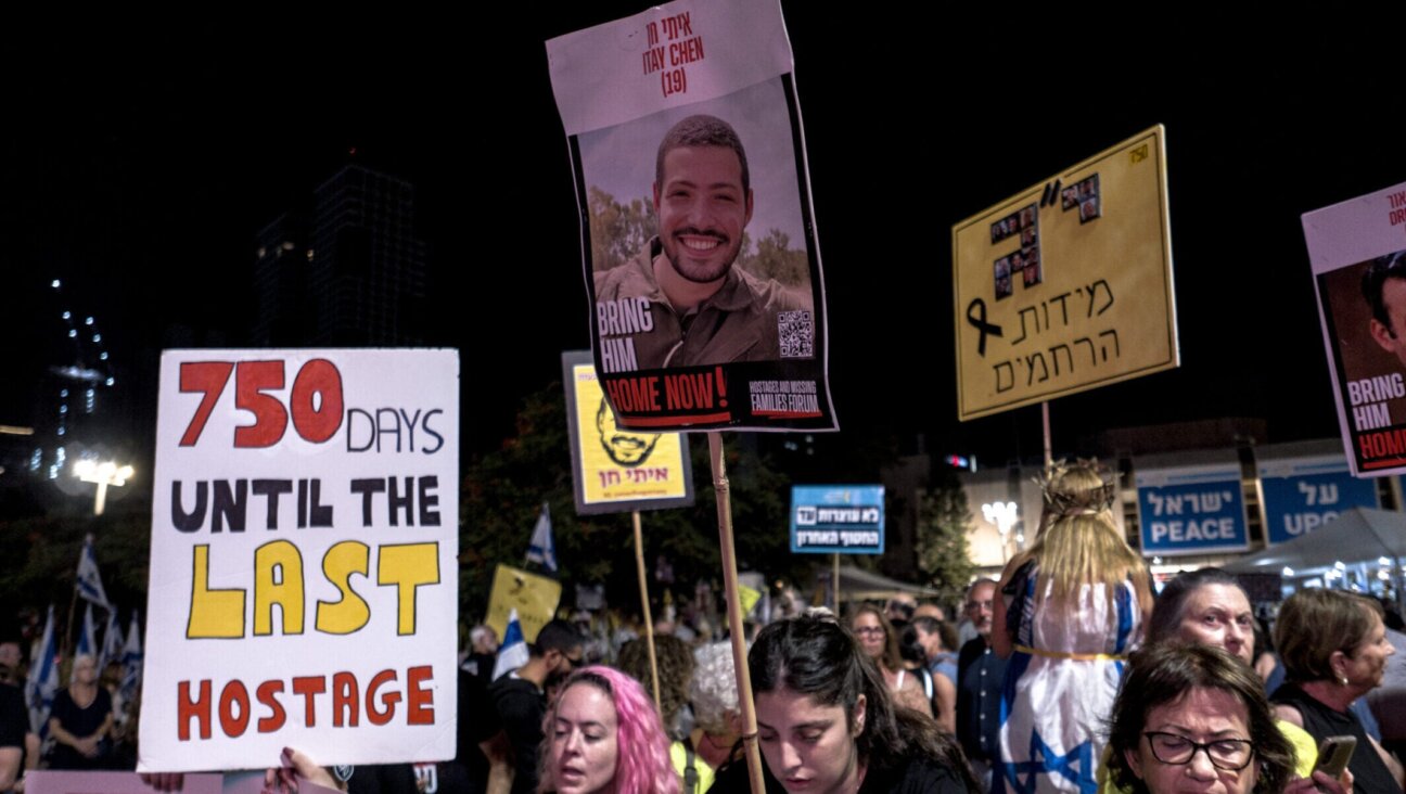 Israelis gather at Hostages Square in Tel Aviv to demand the return of the bodies of 13 citizens still held in Gaza on Oct. 26, 2025.