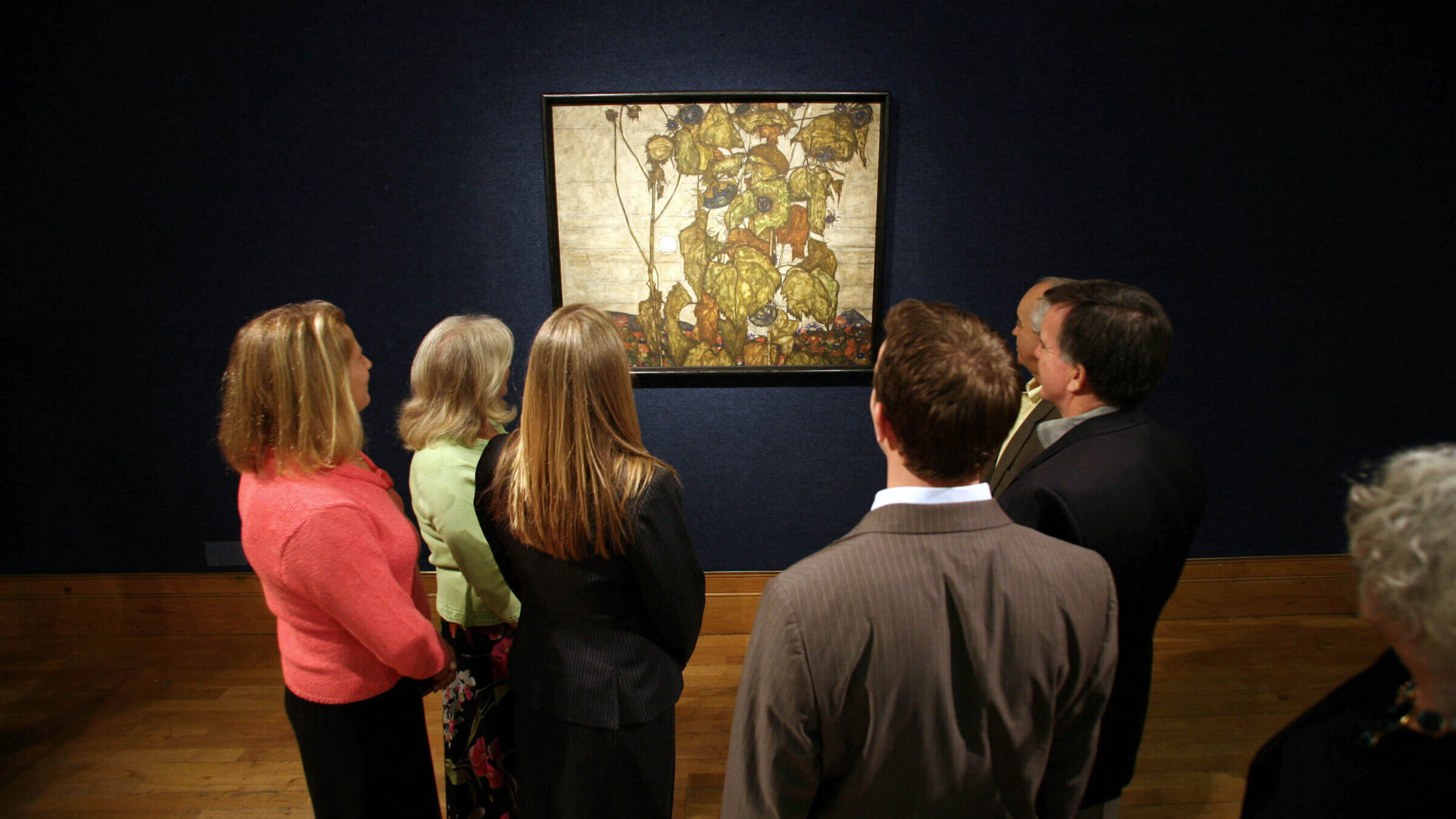 Descendants of Karl Grunwald, the original owner of the Egon Schiele painting, "Sonnenblumen,'' study the painting which inspired Pascal Bonitzer's film 'Auction.'