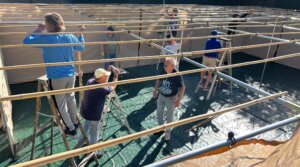 Members of Temple Isaiah’s Men’s Club, Anshei Isaiah, build a new sukkah for the Pasadena Jewish Temple and Center. 