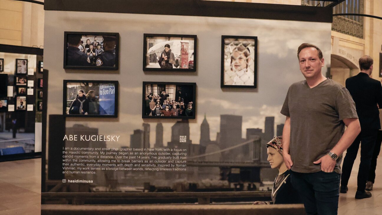 Abe Kugielsky poses in front of his installation at Humans of New York’s “Dear New York” exhibition in Grand Central’s Vanderbilt Hall, running from Oct. 6 to Oct. 19. 