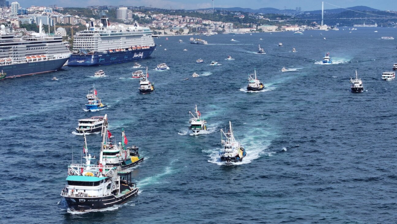 An aerial view shows boats sailing on the sea during a march organized by the Humanitarian Relief Foundation (IHH) and the Palestine Support Platform, in Istanbul, Turkiye, in support of the Freedom Flotilla, which set sail to break the Israeli blockade and oppose the ongoing siege in Gaza, on October 5, 2025. 