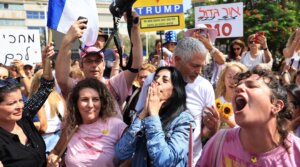Einav Zangauker, the mother of hostage Matan Zangauker, celebrates as people react to the news of the Gaza peace deal at Hostages Square on October 9, 2025 in Tel Aviv, Israel.