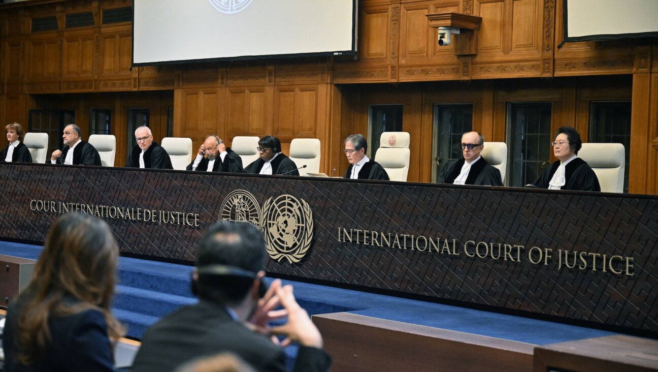 The International Court of Justice (ICJ) gathers to issue an advisory opinion assessing the legal consequences of Israeli restrictions on United Nations (UN) agencies in the Hague, Netherlands on October 22, 2025.