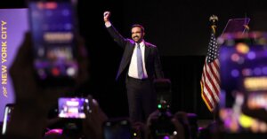 Zohran Mamdani celebrates as he takes the stage at his election night watch party at the Brooklyn Paramount.