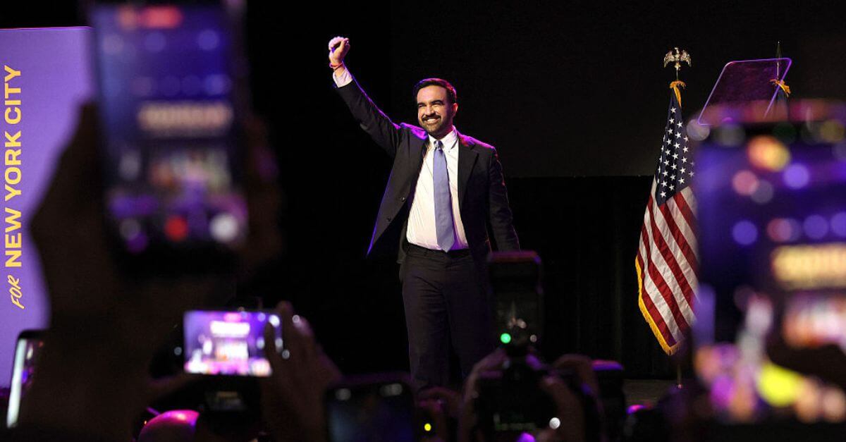 Zohran Mamdani celebrates as he takes the stage at his election night watch party at the Brooklyn Paramount.
