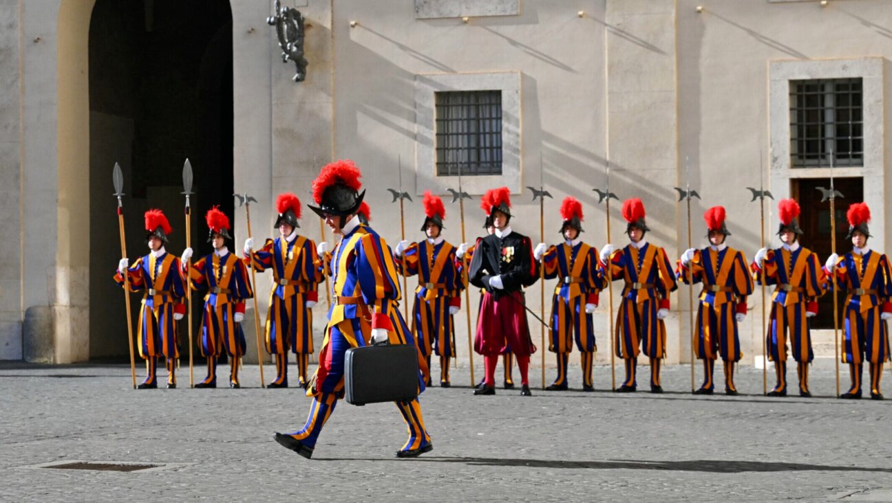 Swiss Guards stand in San Damaso courtyard before the arrival of Palestinian President Mahmud Abbas for a meeting with Pope Leo XIV in the Vatican on Nov. 6, 2025.