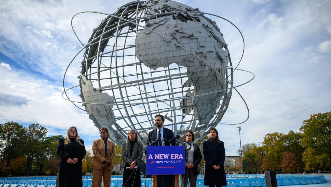 Mayor-elect of New York City Zohran Mamdani stands alongside members of his transition team at the Unisphere in Flushing Meadows Corona Park, Queens, Nov. 5, 2025. 