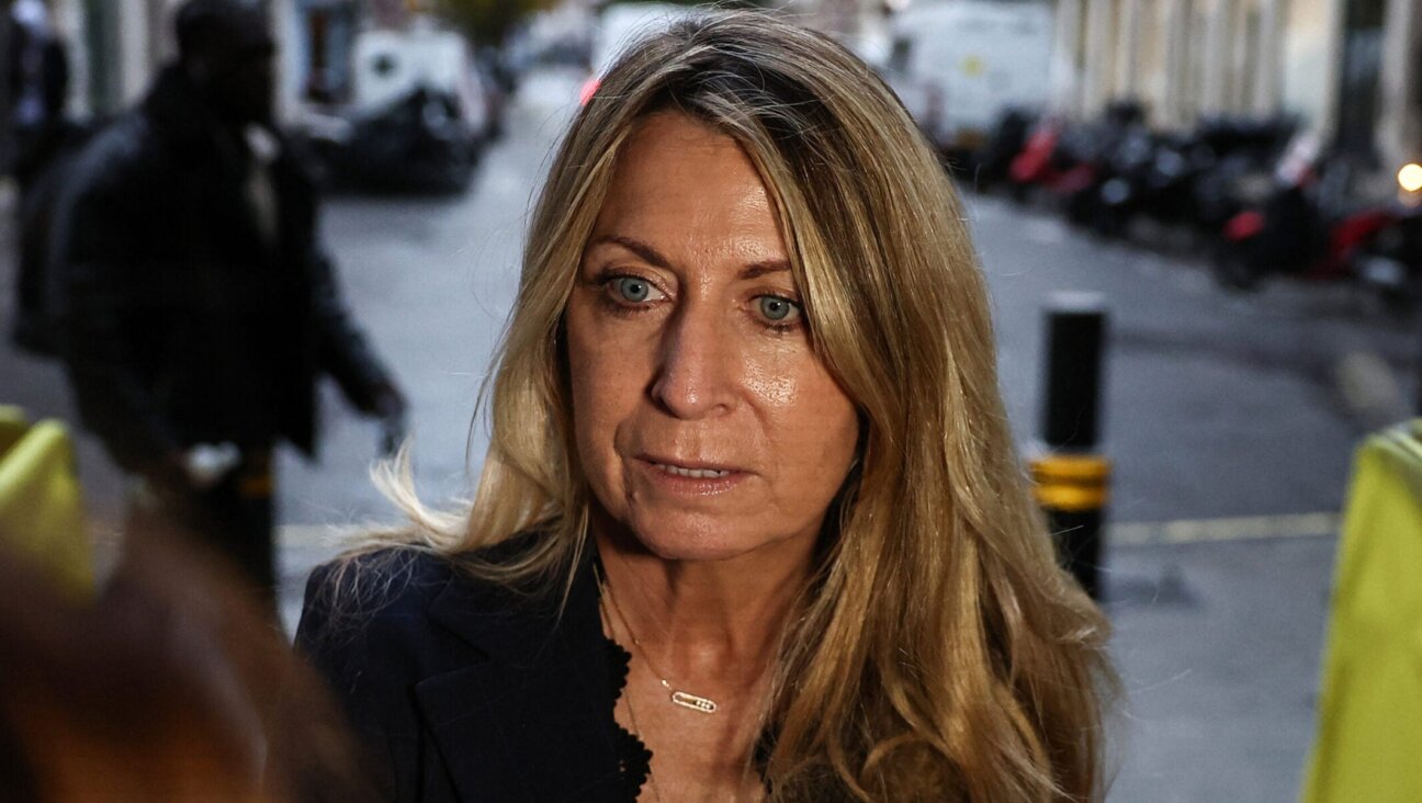 Deborah Turness, who resigned the day before as BBC News CEO, faces the media as she arrives at the offices of the BBC in London, Nov. 10, 2025.