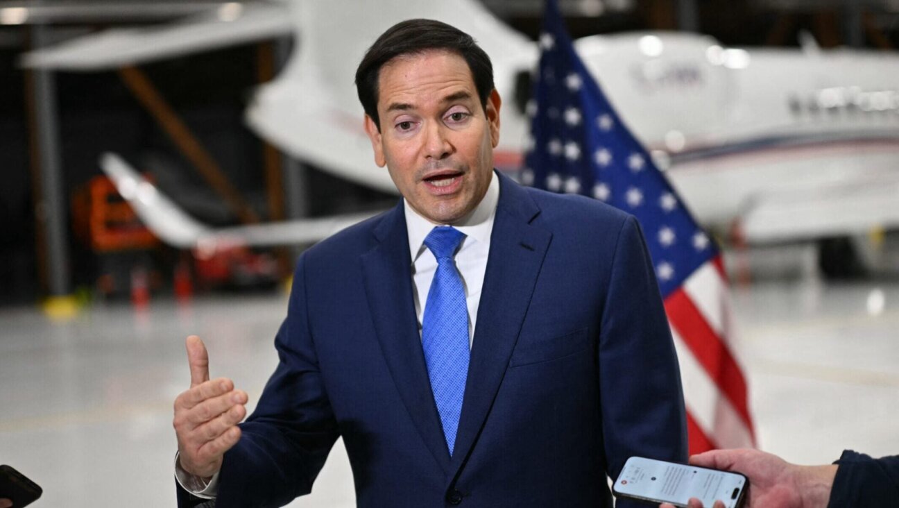 US Secretary of State Marco Rubio speaks to journalists at the airport in Hamilton, Ontario, on Nov. 12, 2025.