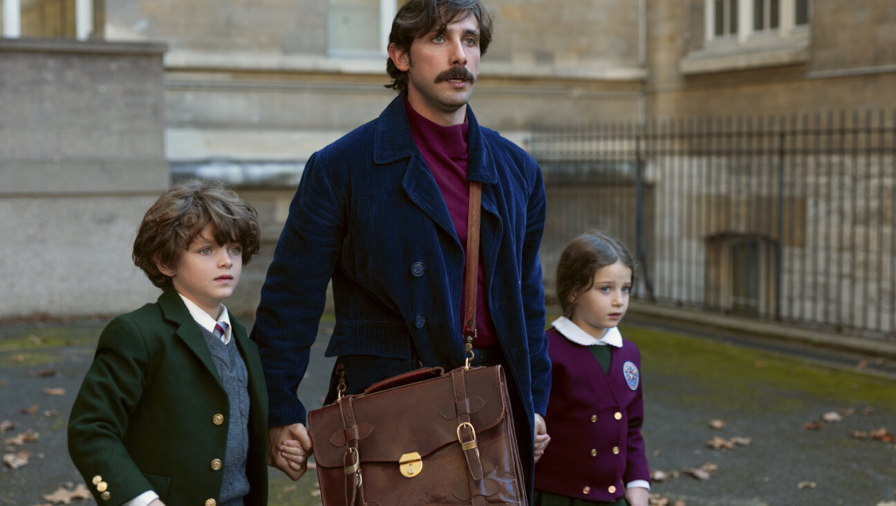 Leo and his children, Isaac and Tamara, in Paris, the first stop on their international flight.