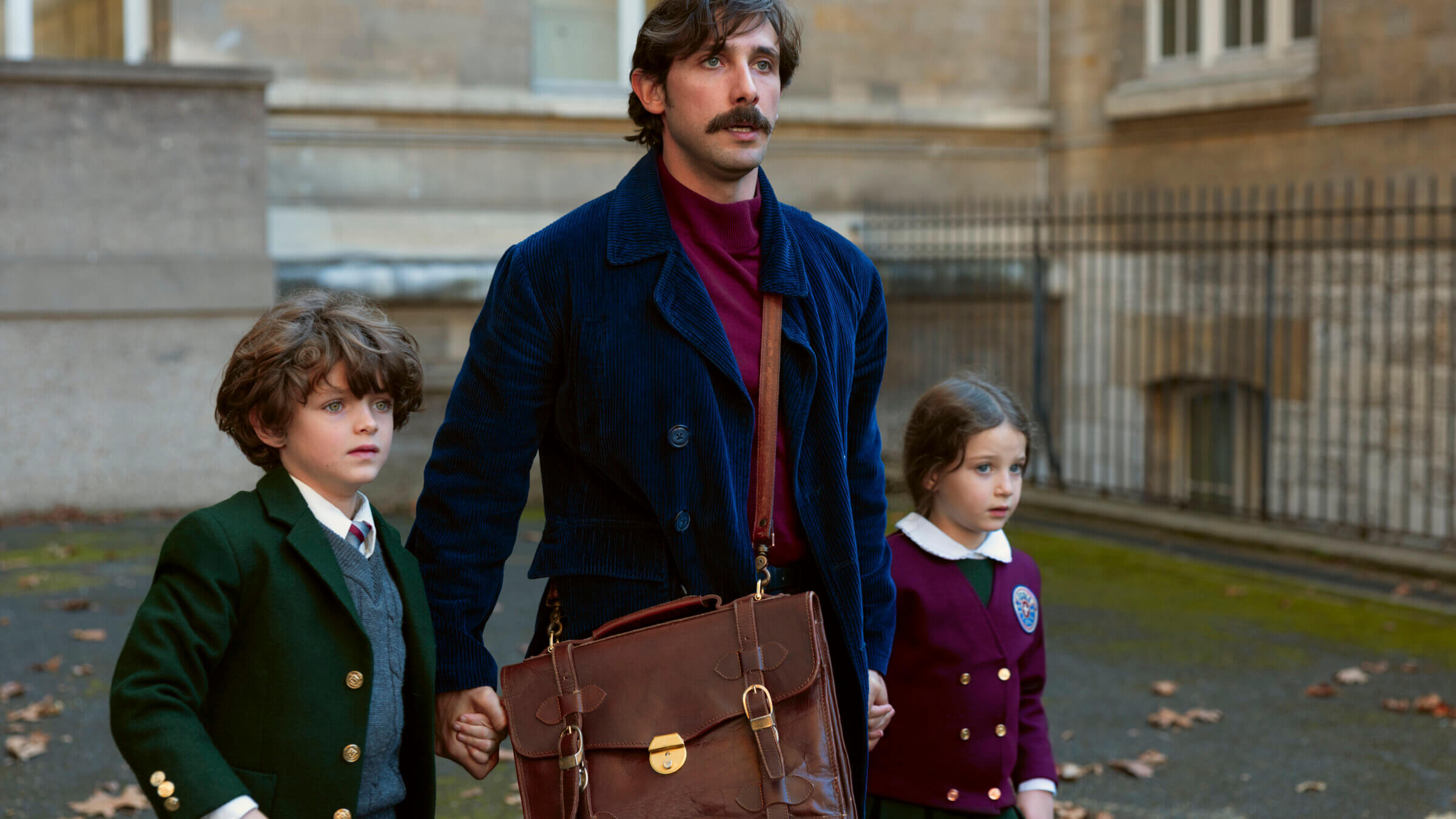 Leo and his children, Isaac and Tamara, in Paris, the first stop on their international flight.