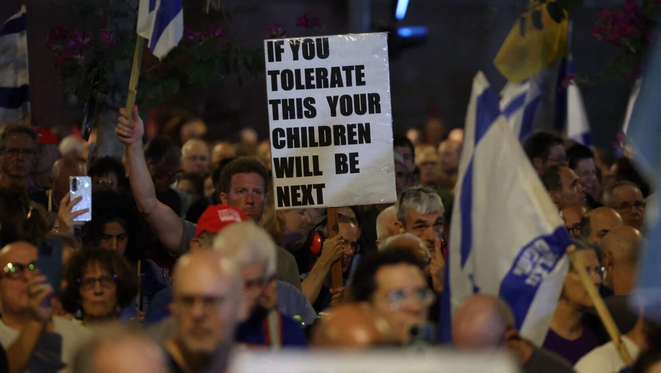 Israeli anti-government protesters at a demonstration against Prime Minister Benjamin Netanyahu demanding the establishment of a state commission of inquiry into the events of October 7, in Tel Aviv on Nov. 8.