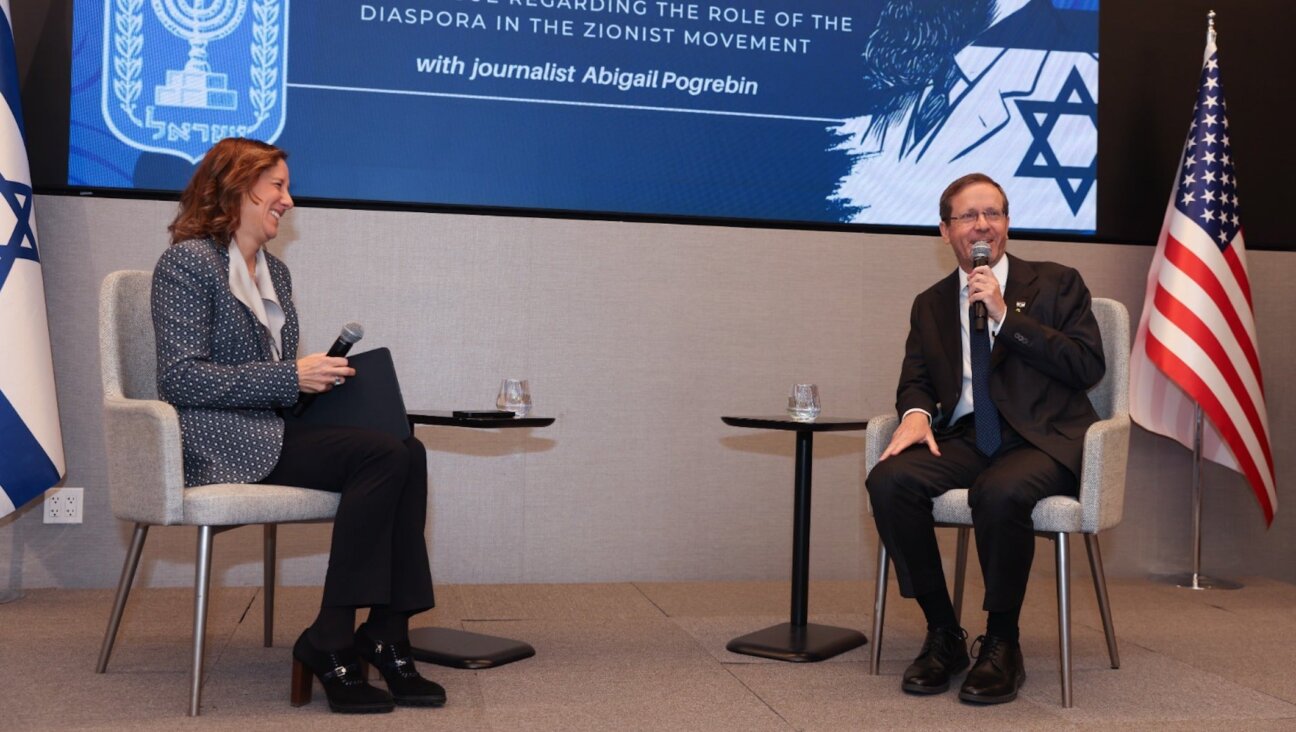 Israeli President Isaac Herzog in conversation with author and journalist Abigail Pogrebin on Dec. 8, 2025, at the Biennial National Assembly of the American Zionist Movement (AZM) in New York City.