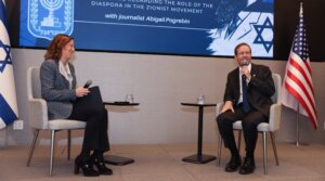 Israeli President Isaac Herzog in conversation with author and journalist Abigail Pogrebin on Dec. 8, 2025, at the Biennial National Assembly of the American Zionist Movement (AZM) in New York City.