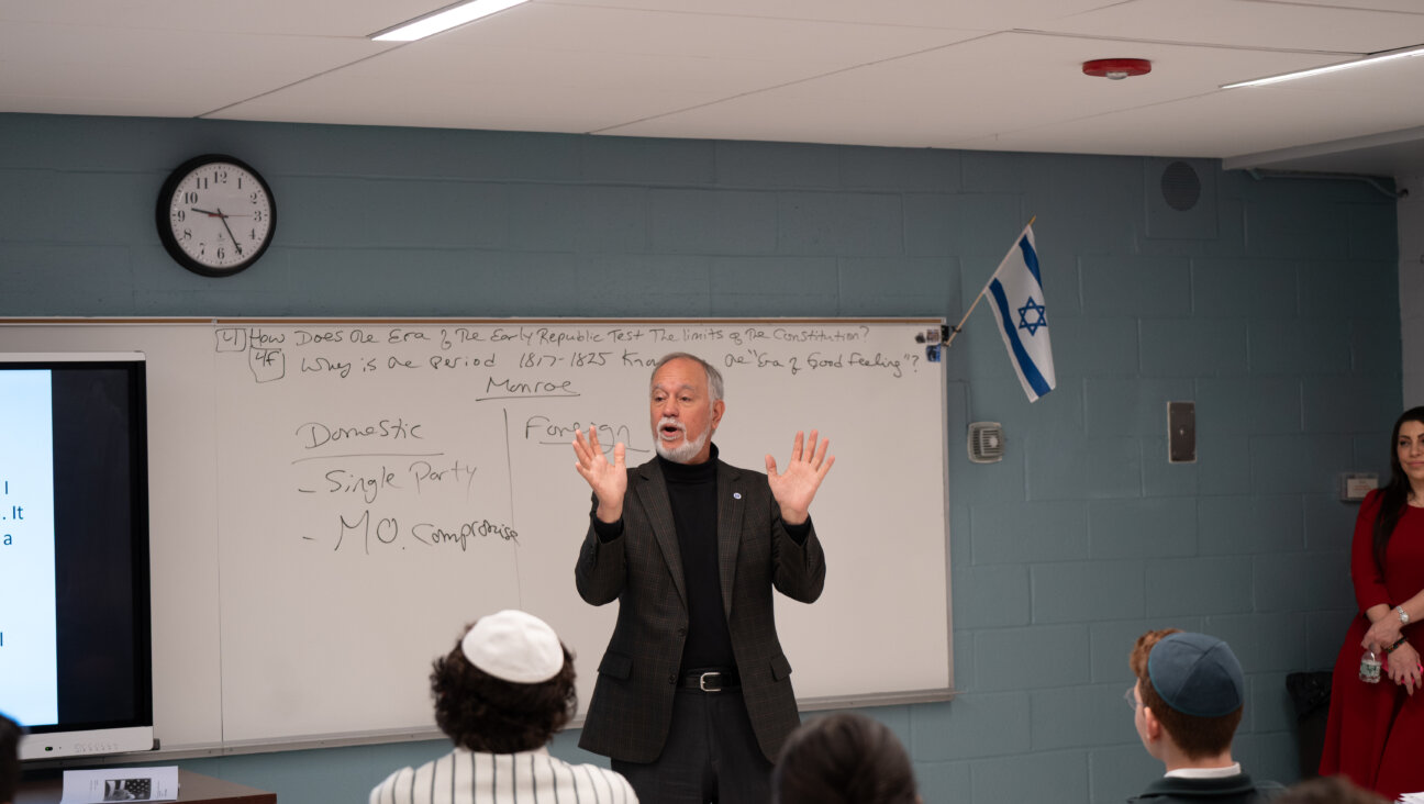 CUNY chancellor Félix Matos Rodríguez speaks to a classroom of students at Yeshivah of Flatbush Joel Braverman High School.