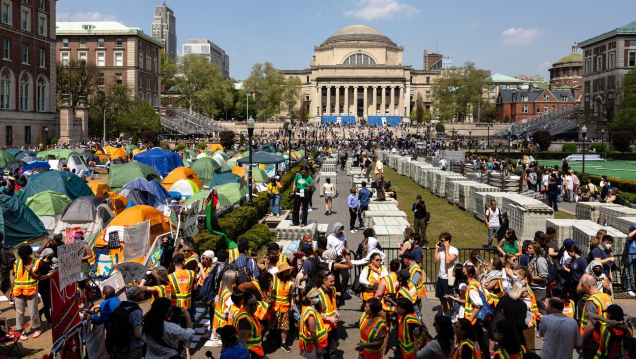 Columbia University faculty members protect students in the Pro-Palestinian “Gaza Solidarity Encampment” on April 29, 2024 in New York City.
