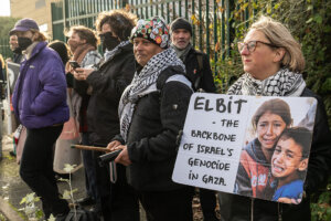 Supporters protest outside the trial of six activists arrested for a break-in at an Elbit Systems site in Bristol, England in August 2024, when they allegedly destroyed quadcopter drones they believed were destined for use against Palestinians in Gaza. 