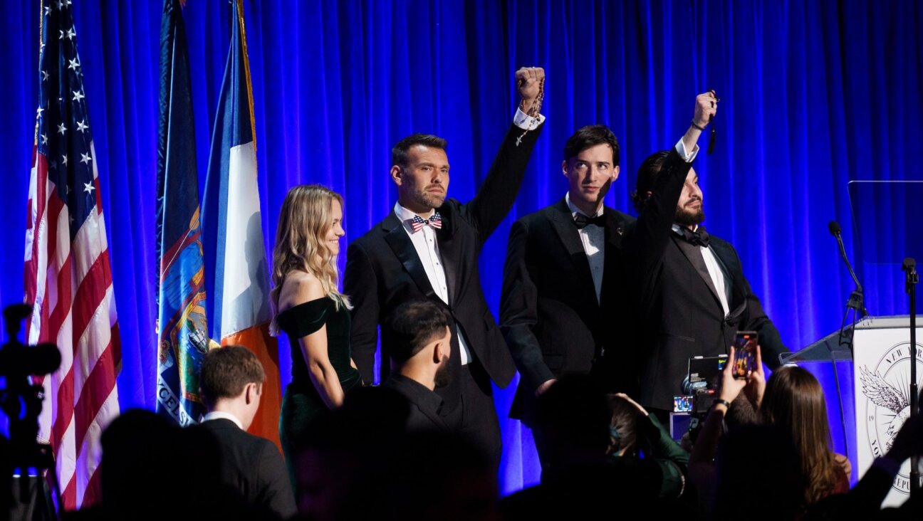 Conservative political activist Jack Posobiec and New York Young Republican Club President Stefano Forte hold up rosaries at the New York Young Republican Club’s 113th Annual Gala at Cipriani Wall Street, Dec. 13, 2025, New York City. 