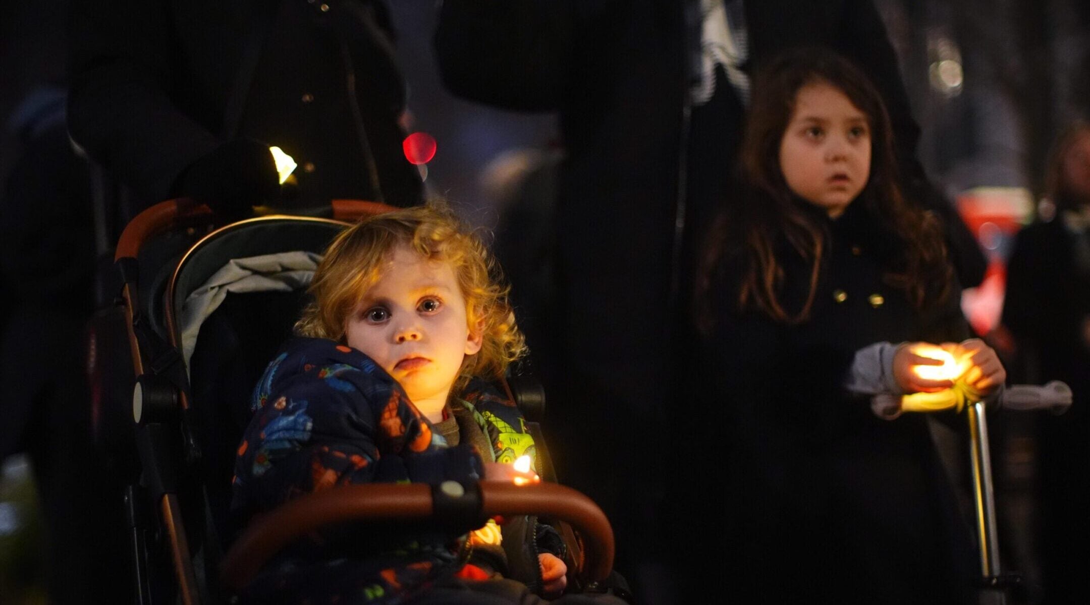 Children attend a vigil outside the Australian High Commission in central London, following the terrorist attack targeting a Jewish celebration at Bondi Beach in Sydney, Australia, on Dec. 14, 2025. 