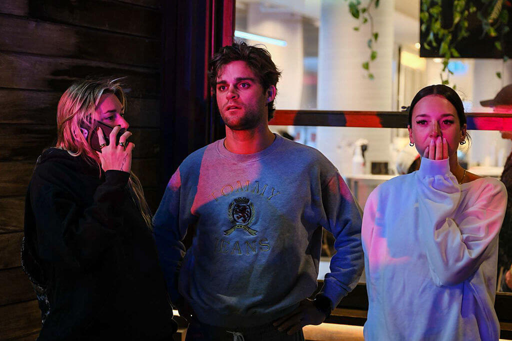 Members of the public look at the scene at Bondi Beach after a mass shooting on December 14, 2025 in Sydney, Australia.