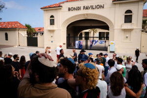 People gather to mourn in the wake of a mass shooting outside Bondi Pavilion at Bondi Beach on December 15, 2025 in Sydney, Australia.