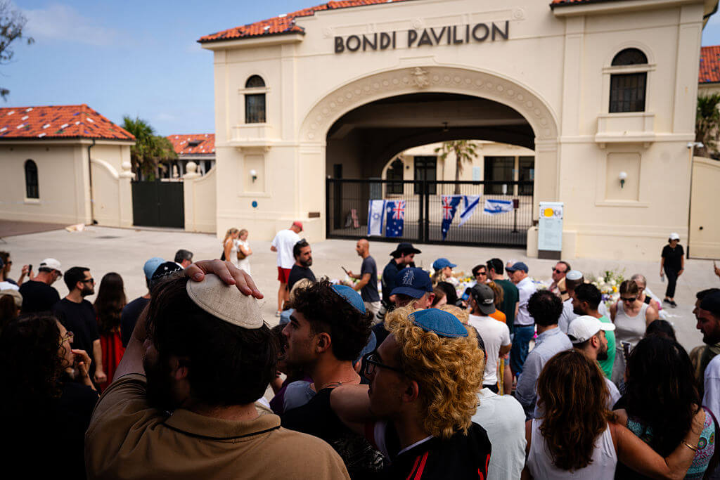 People gather to mourn in the wake of a mass shooting outside Bondi Pavilion at Bondi Beach on December 15, 2025 in Sydney, Australia.