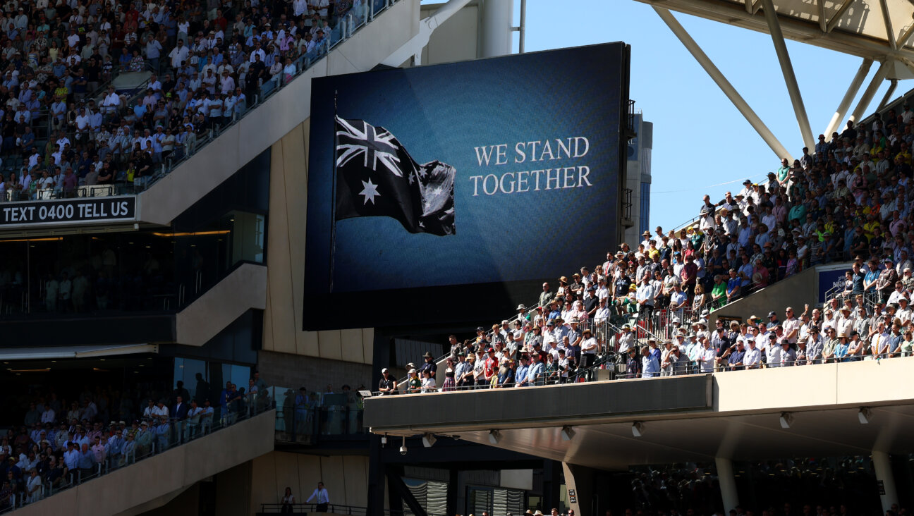 A message on display during a moment of silence to pay respects to the victims of the Bondi shootings during day one of the Ashes Series between Australia and England at Adelaide Oval on December 17, 2025 in Adelaide, Australia.