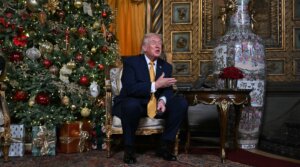 President Donald Trump participates in NORAD Santa tracker phone calls from Mar-a-Lago on Dec. 24.