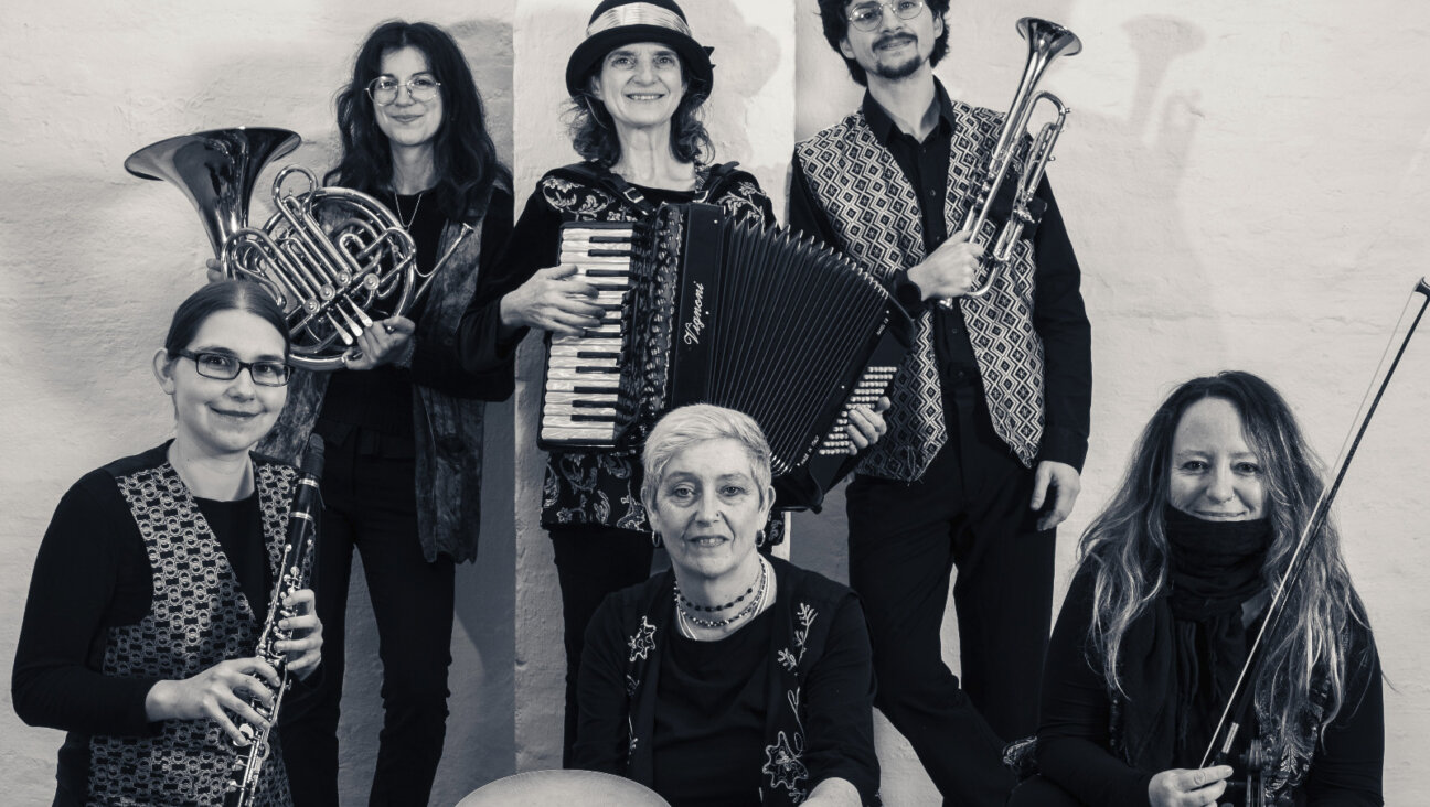 Hop Skotshne is a klezmer ensemble fronted by Hanah Ochner, who has a PhD. in physics.