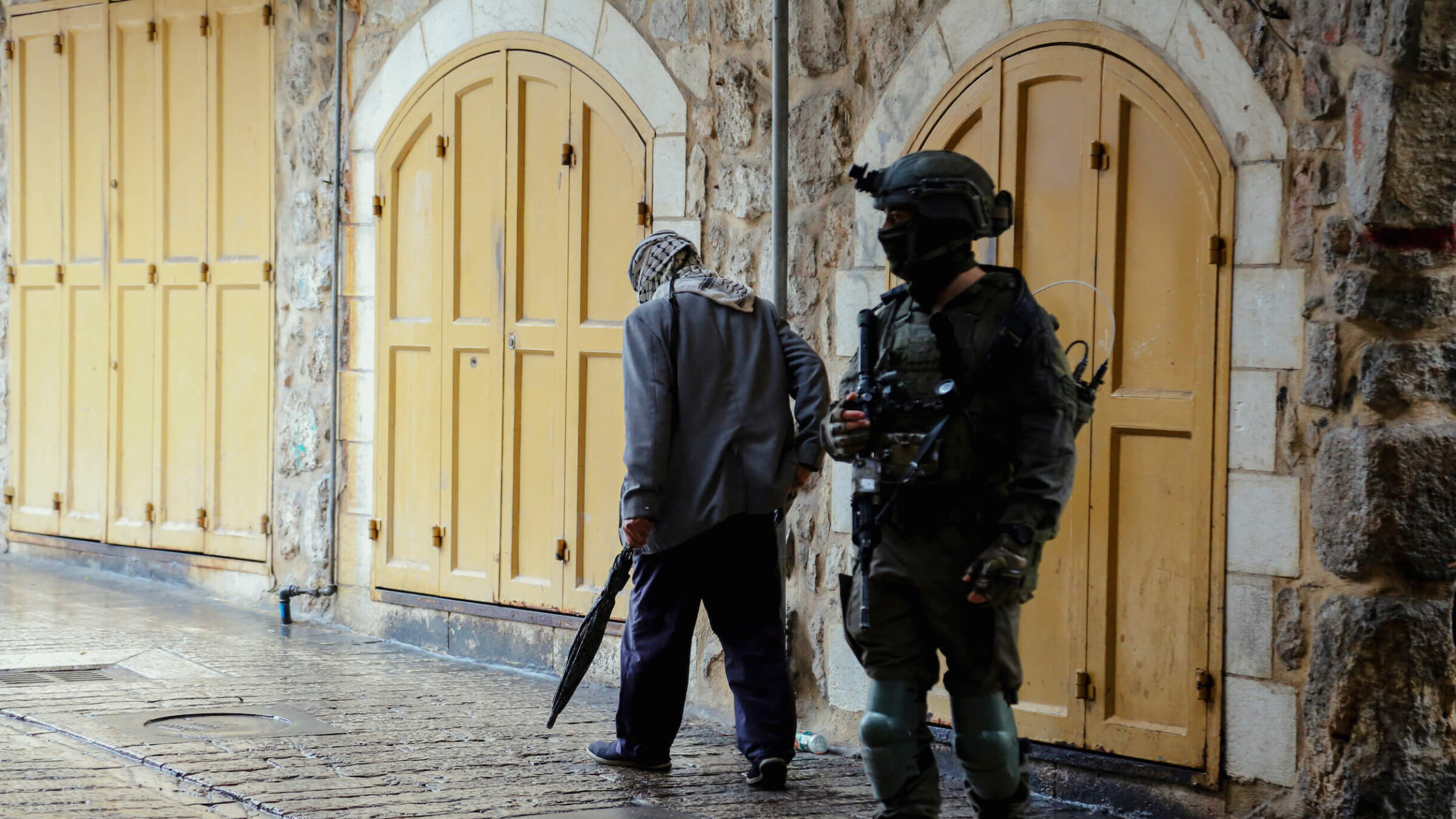 An Israeli soldier guards the Tomb of the Patriarchs, also known as Ibrahimi Mosque, in the Old City of Hebron, in the occupied West Bank, on Nov. 15.