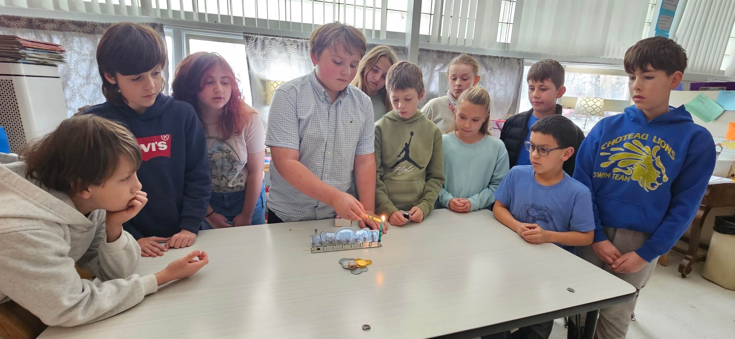 News How Montana teachers use a Hanukkah kit to teach students who’ve never met a Jew A classroom lesson highlights the true story of when Billings residents united against antisemitism By Hannah Feuer 3 min read