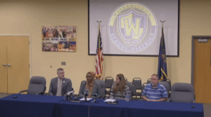 Wissahickon Superintendent of Schools Mwenyewe Dawan, second from left, and School Board President Amy Ginsburg, third from left, speak at a press conference on Dec. 19, 2025.