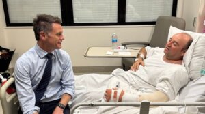 New South Wales Premier Chris Minns visits Ahmed Al Ahmed, 43, at a hospital in Sydney, Australia, on December 15, 2025. 