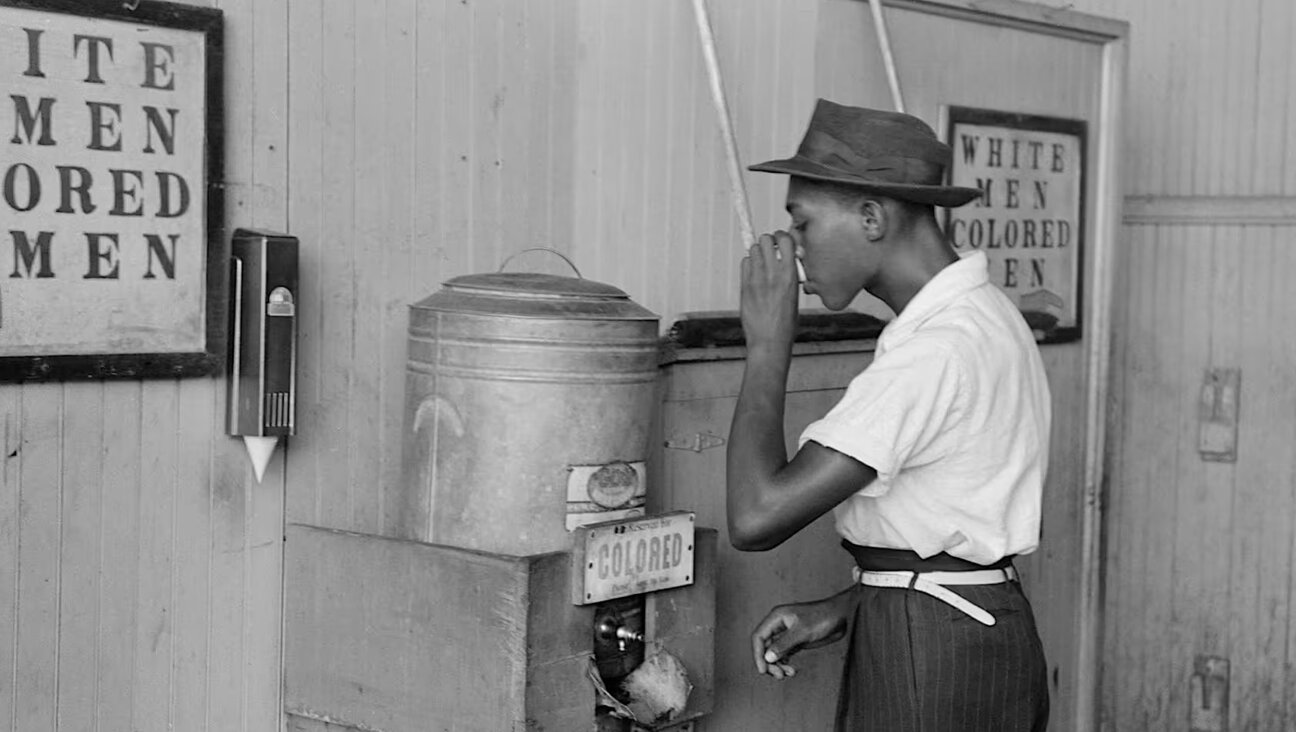 A man outside a segregated bathroom, 2018
