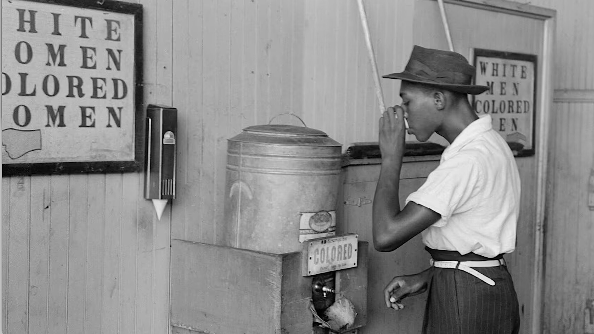 A man outside a segregated bathroom, 2018