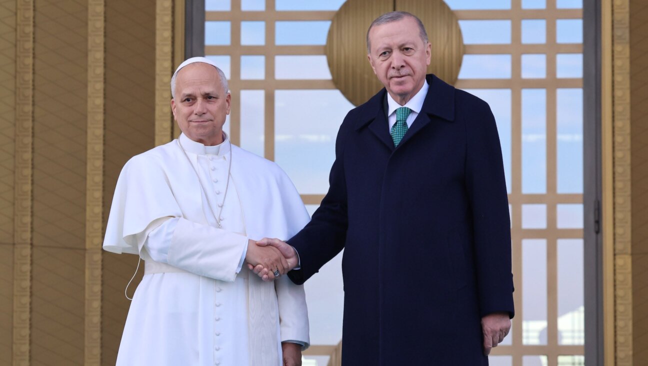 President Recep Tayyip Erdoğan greets Pope Leo XIV at the Presidential Complex during an official welcoming ceremony on Nov. 27, 2025 in Ankara, Türkiye. 
