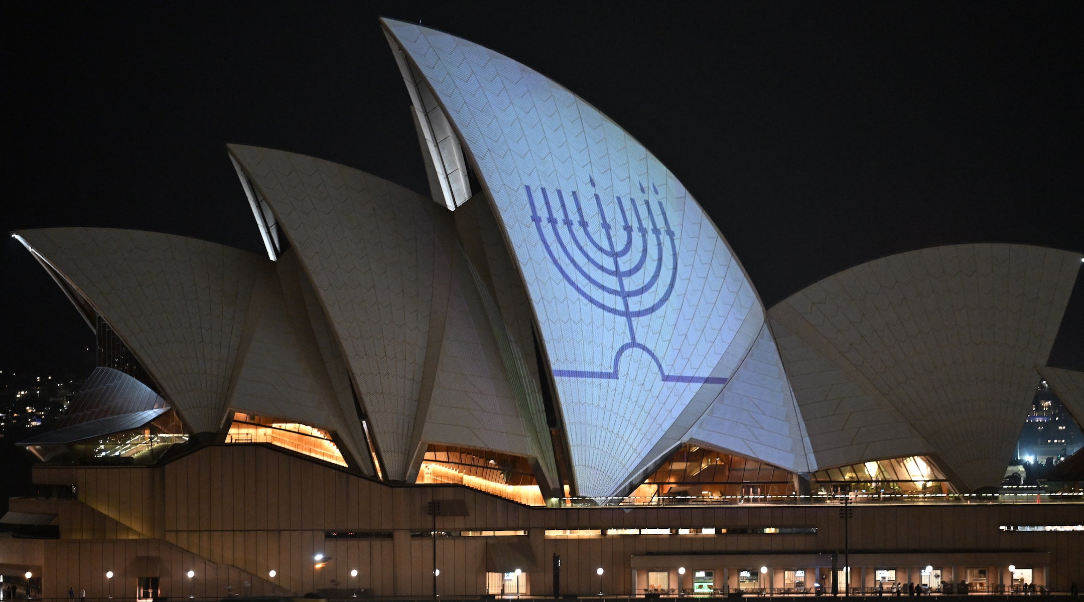 The Hanukkah menorah is projected onto the sails of the Sydney Opera House on December 15, 2025 in Sydney, Australia.