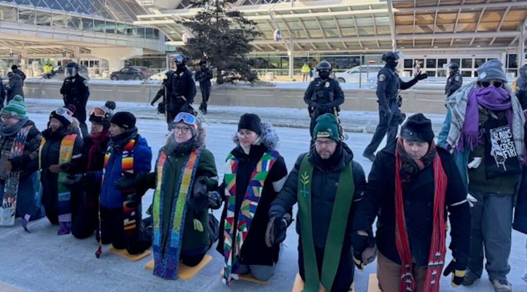 A line of interfaith leaders protest Immigrations and Customs Enforcement at the Minneapolis-St. Paul airport, Jan. 23, 2026. Rabbi Emma Kippley-Ogman, fifth from left, was arrested and briefly detained during the demonstration. 