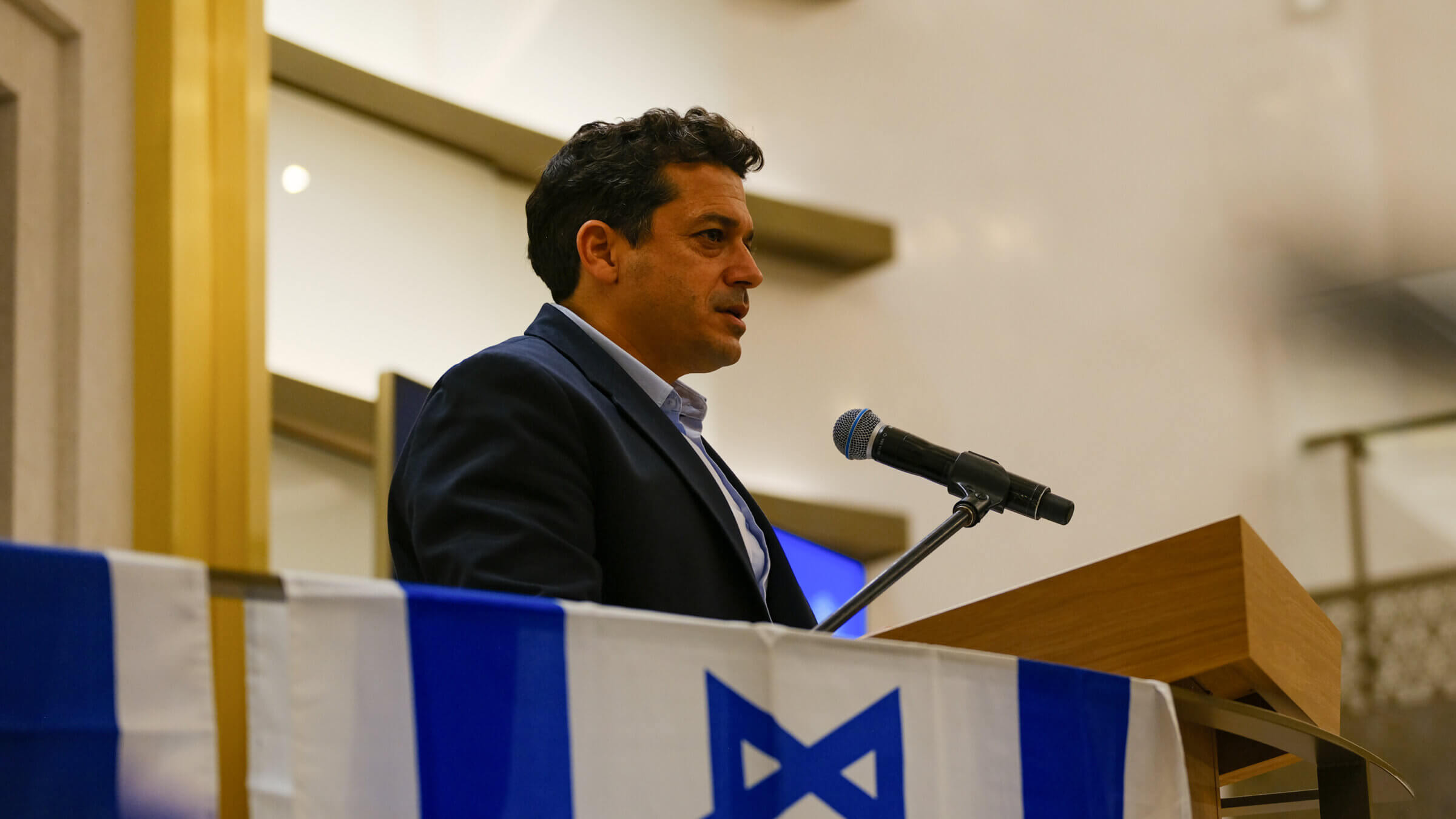 Israeli Minister For Diaspora Affairs and Antisemitism Amichai Chikli speaks during a memorial event at Chabad of Bondi Synagogue on December 17, 2025 in Sydney, Australia.