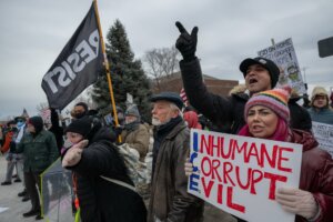 Demonstrators protest ICE on Jan. 15.
