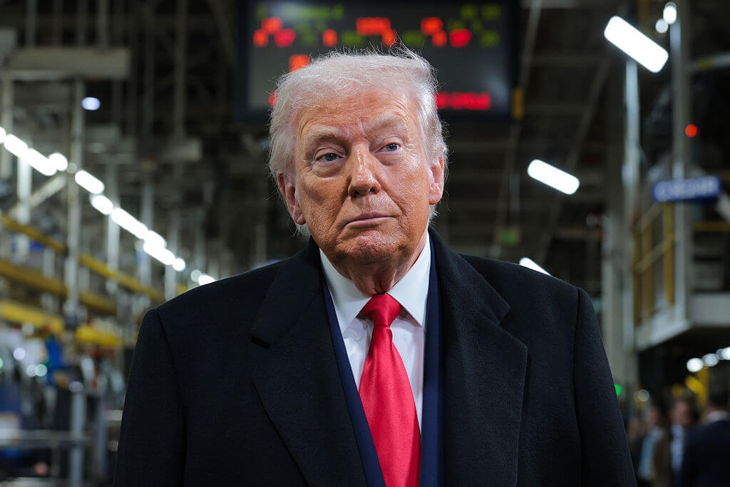 President Donald Trump tours a car factory in Dearborn, Michigan, on January 13, 2026.