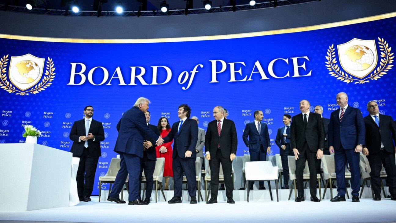 US President Donald Trump shakes hands with Argentina’s president, Javier Milei, at the "Board of Peace" meeting during the World Economic Forum annual meeting in Davos, Jan. 22.