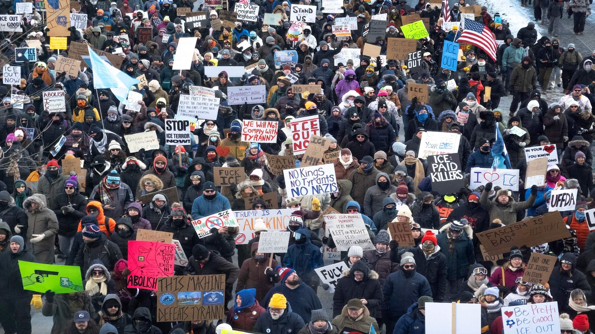 Demonstrators march through downtown Minneapolis protesting ICE operations and the death of Renee Good and Alex Pretti.