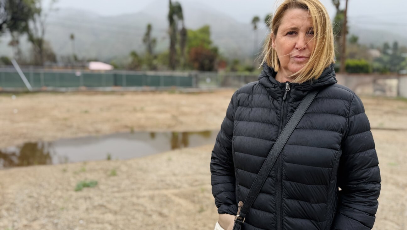 Cantor Ruth Berman Harris at the site of the Pasadena Jewish Temple and Center one year after the synagogue's buildings were destroyed in a wildfire.